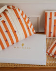coffret-maternite-caramel-sac-a-langer-matelas-a-langer-nomade-protege-carnet-de-sante-caramel-rayures-orange-beige-coeur-bebe-2-milinane