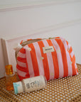 trousse-de-toilette-pour-femme-enfant-et-bebe-motif-lollipop-rayure-orange-et-rose-milinane