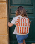 sac-a-dos-enfant-maternelle-en-coton-au-motif-caramel-rayure-orange-coeur-bordeaux-milinane
