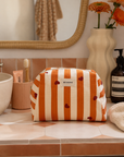 trousse-de-toilette-jade-caramel-rayures-coeurs-marron-orange-terracotta-bordeaux-femme-enfant-bebe-maternite-ambiance-milinane