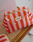 trousse-de-toilette-jade-motif-lollipop-trousse-pour-enfant-femme-et-bebe-rayure-orange-et-rose-milinane